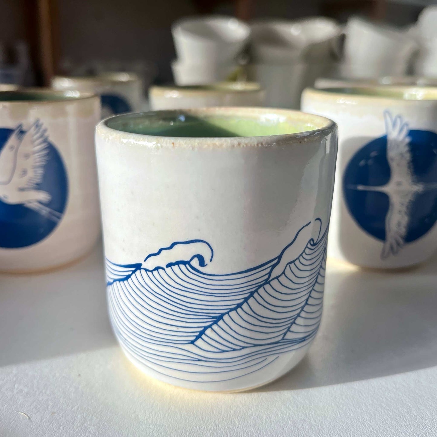 Windhorse Ceramic Cup: Ocean Waves with Verse