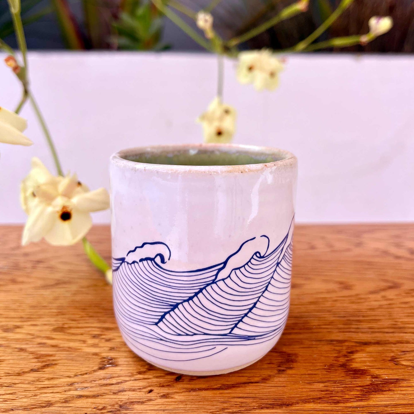 Windhorse Ceramic Cup: Ocean Waves with Verse